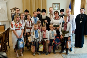 Львів: 9 вихованців дитячого будинку отримали з рук Патріарха Філарета 